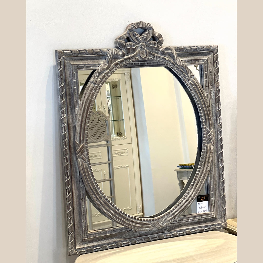 Vintage Carved Wooden Mirror with Ornate Bow Accent